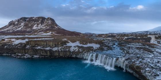 Thjofafoss Panorama Þjófafoss is situated on the Þjórsá River, which is one of the longest rivers in Iceland. The waterfall is found in the Þjórsárdalur valley, northeast of Mount...