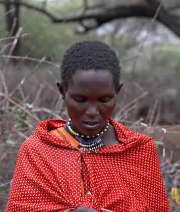 Pensive Maasai Woman Maasai woman seen in Kenya.