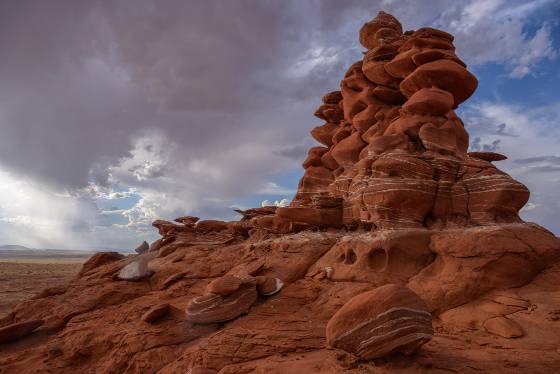 Dust Storm in distance Sky City rock formation on Ward Terrace below the Adeii Eichii Cliffs