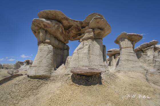 Hoodoo Arch Arch seen in the Chocolate Mushrooms area of the Ah-She-Sle-Pah wilderness.