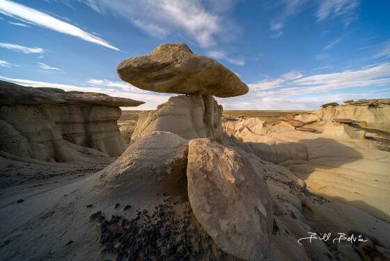 Carefully balanced caprock Balanced Caprock near The King of WIngs in Ah-Shi-Sle-Pah Wash, New Mexico