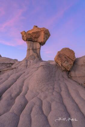 Hourglass Hoodoo at Sunset Hourglass shaped hoodoo in Valley of Dreams, Ah-Shi-Sle-Pah wash, New Mexico.