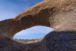 Mile Arch framing the Eastern Sierras Mile Arch in the Alabama Hills, California