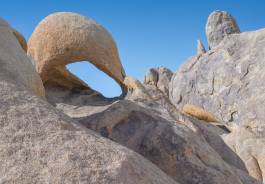 Space Case Arch with Baseball Bat Arch to the right Space Case Arch and the Baseball Bat Arch in the Alabama Hills, California