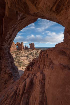 Cove Arch framing Double Arch Cove Arch framing Double Arch in Arches National Park