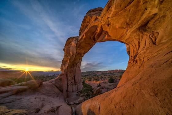 Broken Arch Sunburst Broken Arch in Arches NP at sunrise