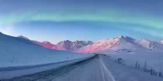 Aurora over the Chandalar Shelf The aurora over the Dalton Highway at Chandalar Shelf, five miles south of Atigan Pass.