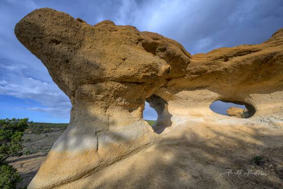 Caballo Canyon Triple Arch 4 Caballo Canyon Triple Arch seen near Aztec, New Mexico.