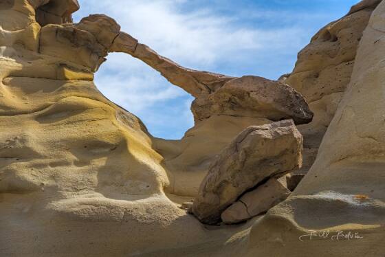 De-Na-Zin Arch 1 De-Na-Zin arch on the rim above De-Na-Zin wash in the Bisti-De-Na-Zin wilderness