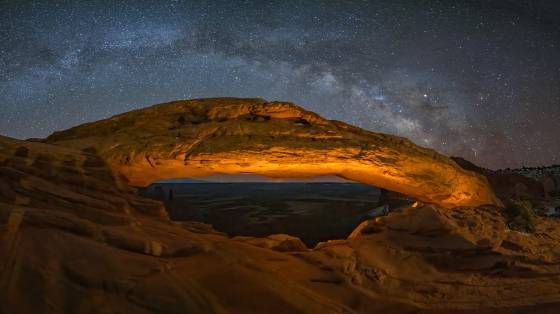 The Milky Way over Mesa ARch The Milky Way rising over Mesa Arch, note the shadows of the photographers on the left