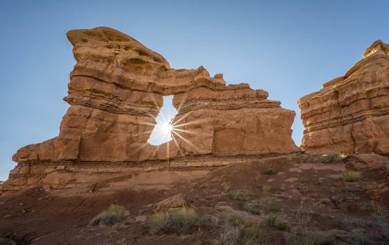 Burro Wash Arch Sunstar Burro Wash Arch in Capitol Reef National Park, Utah