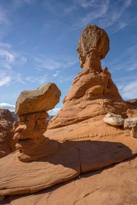 Hoodoos 11 Hoodoos of Dakota Caprock over Entrada Sandstone in Pedstal Alley near the Burr Trail in Utah.