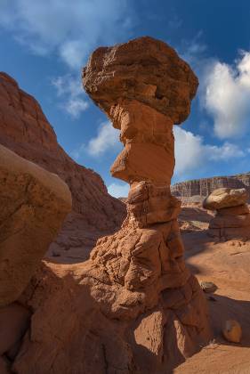 Hoodoos 14 Hoodoos of Dakota Caprock over Entrada Sandstone in Pedstal Alley near the Burr Trail in Utah.