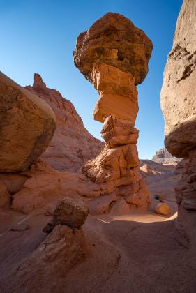 Hoodoos 15 Hoodoos of Dakota Caprock over Entrada Sandstone in Pedstal Alley near the Burr Trail in Utah.