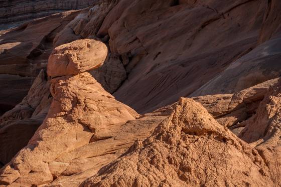 Hoodoos 16 Hoodoos of Dakota Caprock over Entrada Sandstone in Pedstal Alley near the Burr Trail in Utah.