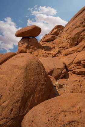 Pedestal Alley Hoodoo 2 Hoodoos of Dakota Caprock over Entrada Sandstone in Pedstal Alley near the Burr Trail in Utah.