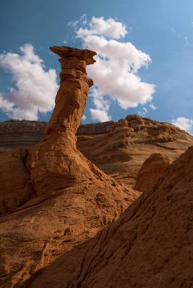 Pedestal Alley Hoodoo 7 Hoodoos of Dakota Caprock over Entrada Sandstone in Pedstal Alley near the Burr Trail in Utah.