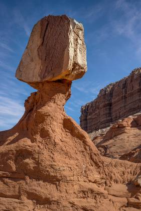 Vertical Caprock 2 Hoodoos of Dakota Caprock over Entrada Sandstone in Pedstal Alley near the Burr Trail in Utah.