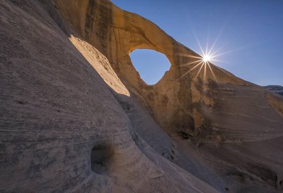 Cedar Wash Arch Sunburst 1 Cedar Wash Arch in Grand Staircase Escalante National Monument in Utah