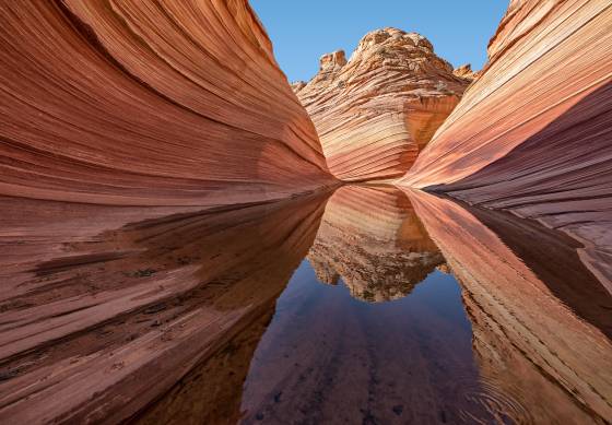Water at The Wave 13 Looking south at a reflection in a water pool at The Wave in Coyote Buttes North, Arizona