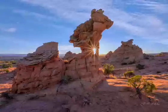 Sunburst at The Olympic Torch The Olympic Torch rock formation in the Cottonwood Cove area of Coyote Buttes South, Arizona