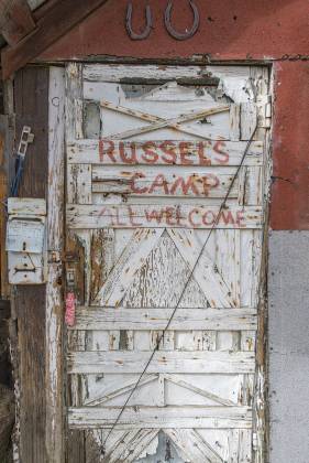 Russell's Camp Doorway Doorway to a cabin in Russell's Camp, Butte Valley, Death Valley. Sign mispelled!