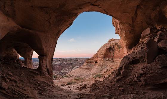 Reflected Light morning Colonnade Arch, also knowqn as Five Hole Arch, in Utah