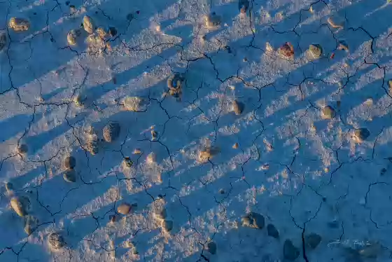 Cracked Earth Cracked earth and pebbles near the Hanksville Burpee Dinosaur Quarry