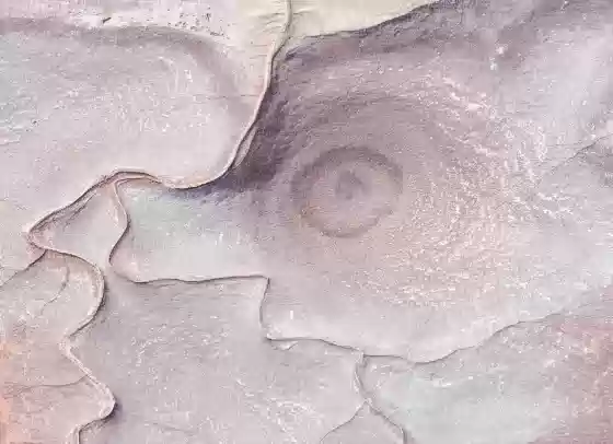 Nipple Hill 1 Eroded badlands with a nipple llike appearance near Cow Dung Road in Utah. A pig's head can also be clearly seen in the image..