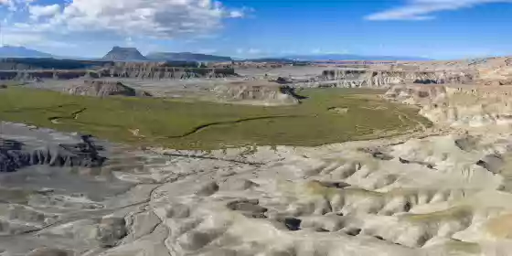 Wild Hiorse Road Panorama 1 Looking south at Muddy Creek, Factory Butte, and the Henry Mountains.