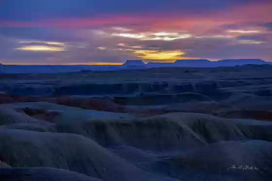 Factory Butte Badlands 3 The badlands north of Factory Butte in Utah at sunset