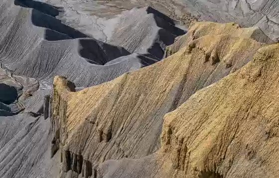 Mancos Shale 1 View of the badlands seen along the hike to the top of North Caineville Mesa in Utah