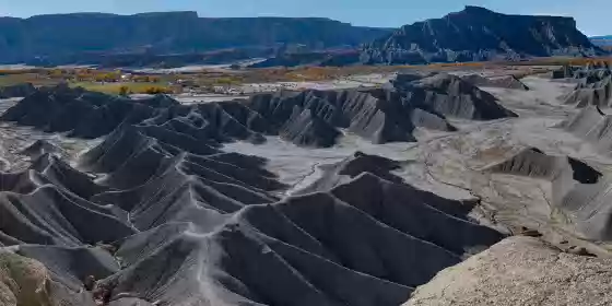 Panorama 1 View of the badlands seen along the hike to the top of North Caineville Mesa in Utah
