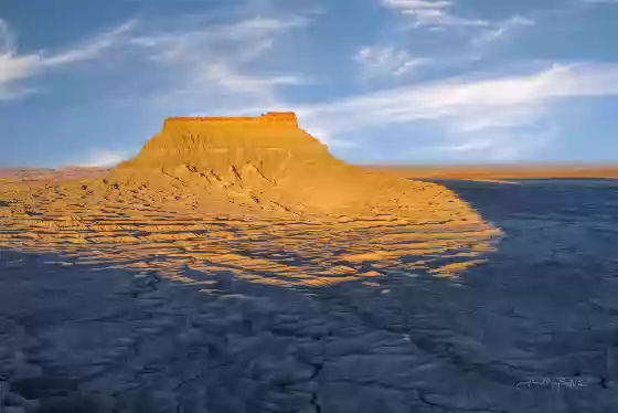Southwest Face of Factory Butte Aerial of Factory Butte as seen from the north end of North Caineville Mesa at sunset.