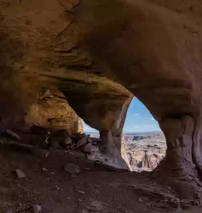 Refleted Light Colonnade Arch, also knowqn as Five Hole Arch, in Utah