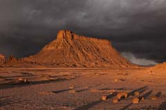 Storm clouds over Factory Butte near Hanksville, Utah