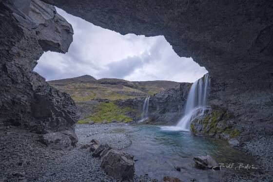 Skutafoss seen from Alcove Skutafoss waterfall seen from alcove on the river Þorgeirsstaðaá in Iceland.