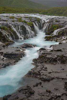 Bruarfoss Vertical Bruarfoss, the Blue Waterfall, lies in the Golden Circle of Iceland
