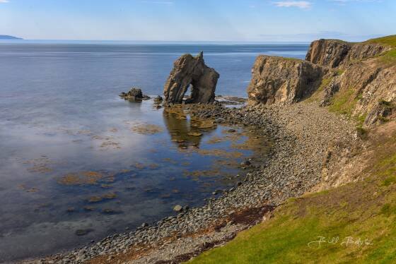 Gatanof Arch 3 Gatanof Arch, also known as Bakkastakkur Arch Rock, near the town of Husavik. Shot at low tide. Arch is best high tide.