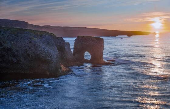 Sunrise at Raudanes Arch 3 Sunrise at Raudanes Arch 3 on Raudanes Cape, Iceland.