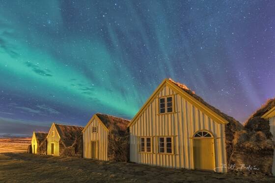 Glaumbaer Aurora 1 Aurora over the Glaumbaer Turf Houses in northwest Iceland.