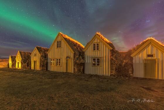 Glaumbaer Aurora 2 Aurora over the Glaumbaer Turf Houses in northwest Iceland.