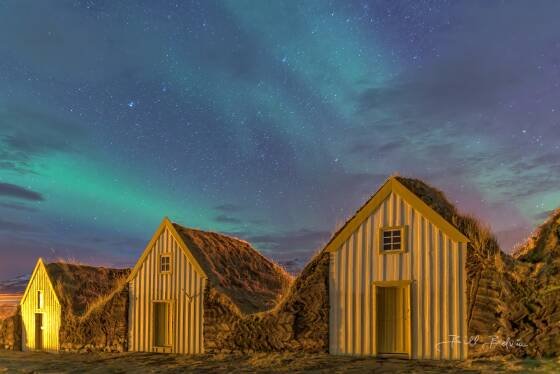 Glaumbaer Aurora 3 Aurora over the Glaumbaer Turf Houses in northwest Iceland.