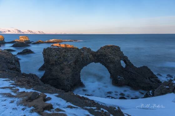 Gatklettu Basalt Sea Arch Gatklettu basalt sea arch on the east cost of Snaefellsnes Peninsula in Iceland.