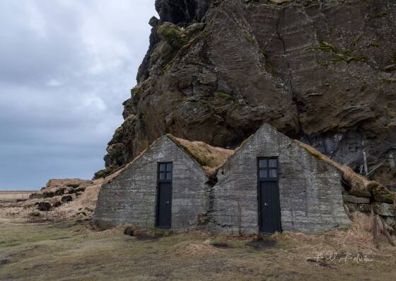 Drangshlid 1 Drangshlid, an old farmhouse with a turf roof near Skogafoss in Icelend.