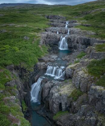 Pingmannaa Falls 4 Pingmannaa falls, a multi-tier waterfall in Westfjords, Iceland.
