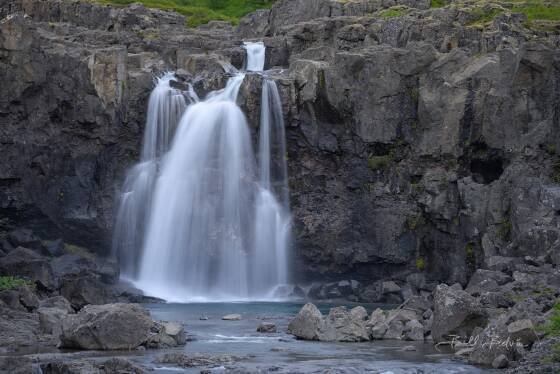 Pingmannaa Falls Pingmannaa falls, a multi-tier waterfall in Westfjords, Iceland.