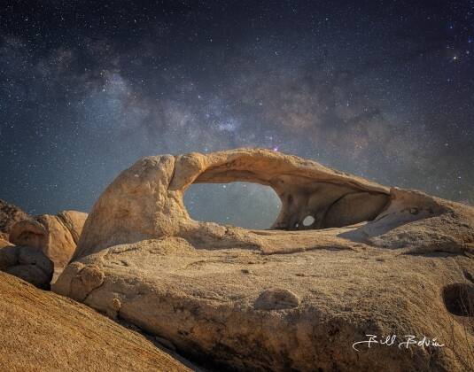 Ojo Oro Arch and Milky Way - 1 The Milky Way seem above Ojo Oro Arch in northeast Joshua Tree National Park, California.