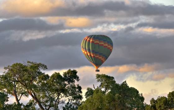 Hot Air Balloon Ride Hot Air Balloon seen over the Maasai Mara.