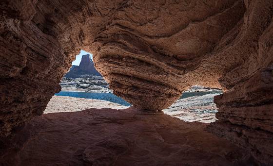 Double Arch on Vivid Rock Butte framed by a Double Arch on Vivid Rock